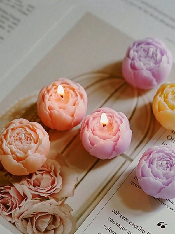 9602-cmtl8e.jpg Coffret de quatre bougies fleurs parfumées
